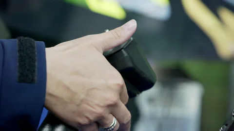 Close-up of a driver's hand with a joystick on a rig simulator. Stock Footage 162270236