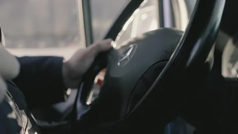 Close-up, the driver's hands hold the steering wheel of the car Stock-Footage 195219688