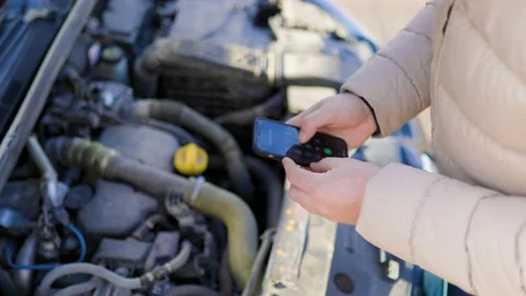 A close-up of a driver's hands holding a Stock Footage 234691204