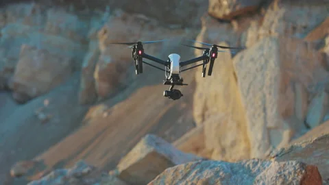 Close up drone flies on background rock. Modern technologies for shooting photos Stock-Footage 175399525