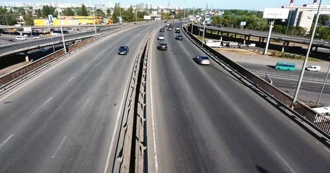 Close-up drone flight over the full of cars transport interchange in Kyiv near Stock Footage 82650025