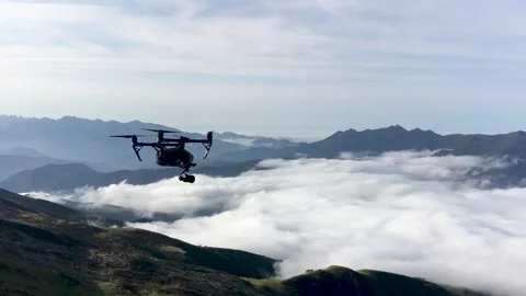 Close-up of a drone flying above the clouds Video stock 313224229