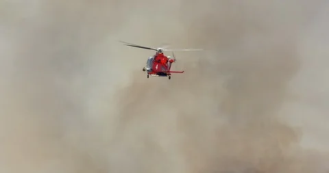 Close drone footage of huge wildfire in Hollywood hills. Helicopter Stock Footage