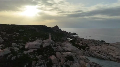 Close Drone Orbit Around Stone Lighthouse Sardegna Rocky Coast Sunset Stock Footage 333458356