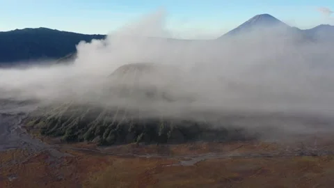 Close-up drone push over the crater and volcanic plains of Mount Bromo Stock Footage 338104612