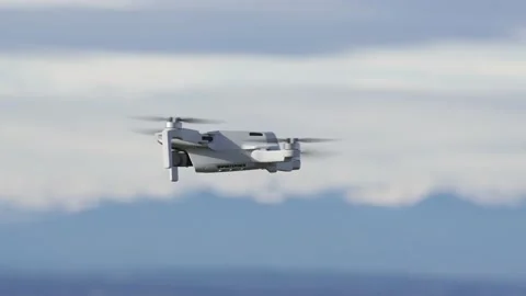 Close-up of a drone rotating on itself with blurred background Stock Footage 168227531
