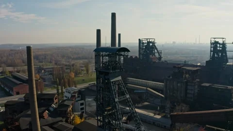 Close Drone shot around mining tower in lower Vítkovice industrial Area in Видео 332819960