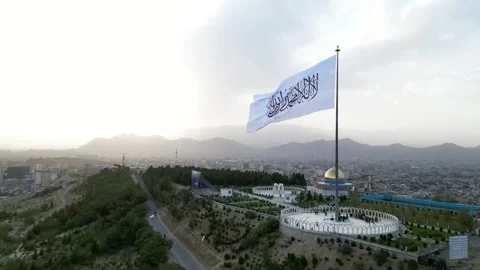 Close-Up Drone Shot of White Flag on Wazir Akbar Khan Hill, Kabul Stock Footage 296764917