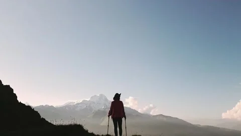 Close up drone silhouette shot captures woman person standing triumphantly .. Vídeos de archivo 328873148