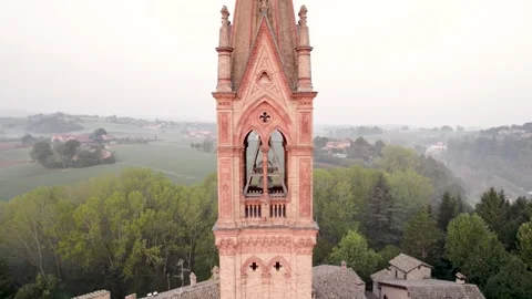 Close up drone view of Castelvetro di Modena medieval bell tower in Emilia Stock Footage 297283465