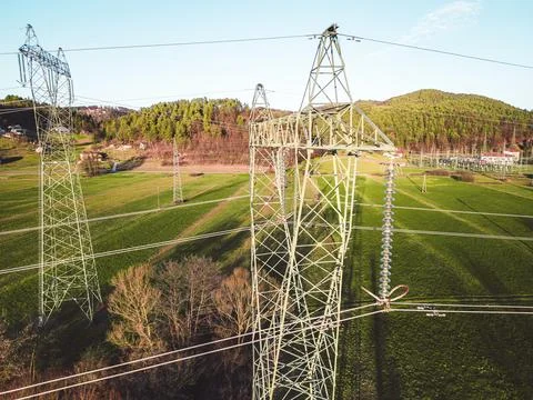 Close up drone view of electrical tower in the country side of Slovenia Stock Photos
