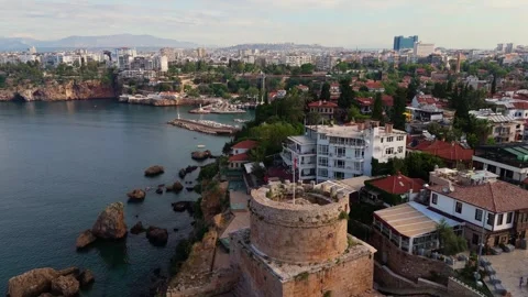 Close up drone view flying over the ancient stone Hidirilik Tower on the rocky 動画素材 336699218
