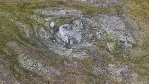 Close drone view of folded rock outcrop in tundra near Lavrentiya Bay, Chukotka Stock Footage 327121913