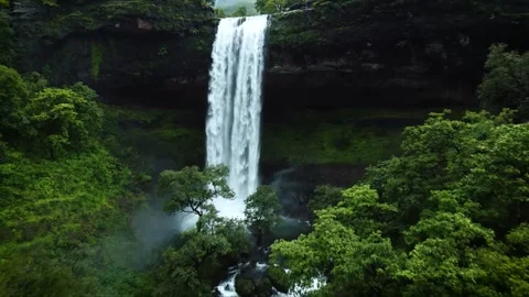 Close-Up Drone View of Waterfall Cascading from the Front Stock Footage 285074817