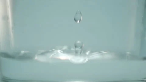 Close up drop into glass 스톡 동영상 240133913