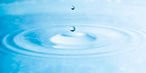 Close up drop of water Stock Photos