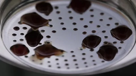 Close up droplet from automatic coffee maker caffeine working filtration in Stock Footage 336585314