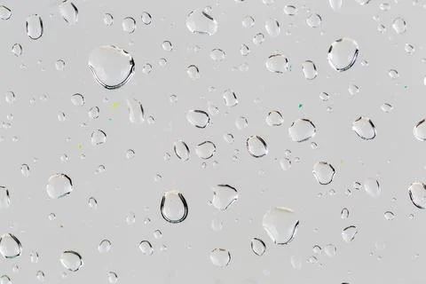 Close up droplets white surface Stock Photos