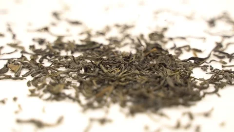 Close up dropping tea leaves slow motion Stock Footage 110897607