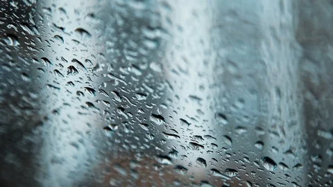 Close-up drops fall on the glass. Summer Rain outside the window. Stock Footage 109430334