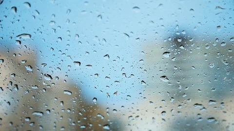Close-up drops fall on the glass. Summer Rain outside the window. Stock Footage 109430409