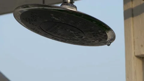 Close up drops of water falling from the shower siphon. Stock Footage 167799722