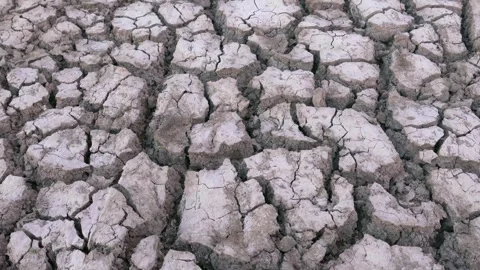Close-up drought-related soil cracks, drought caused by global warming, Stock Footage 285946075