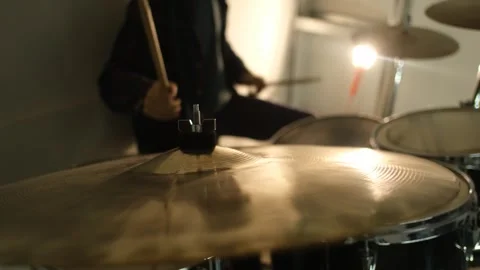 Close-up on a drum cymbal, the guy plays the drums 스톡 동영상 241081935