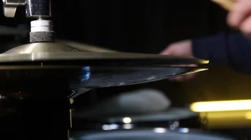 Close up of drum plate hi hat and a drummer playing on drums. Slider shot. Stock Footage 85877998