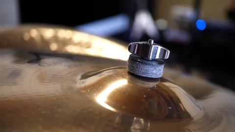 Close up on a drum set cymbal in a garage band rock and roll recording Stock Footage 124285461