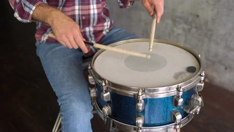 Close up of drum sticks bang on the drum. online lessons. video class. Stock Footage 155554226