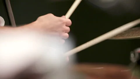 Close up of drummer striking percussion during live performance Stock Footage 336467033