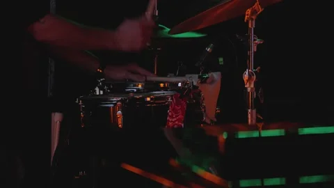 A close-up of a drummer's hand striking a snare drum and cymbal Stock Footage 344873126
