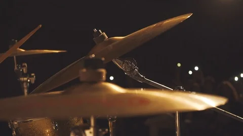 Close drums playing in slow motion . Drum kit on stage lights performance Stock Footage 105372739
