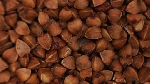 Close-up of dry buckwheat showcasing texture for healthy eating presentations Stock Footage 288859078
