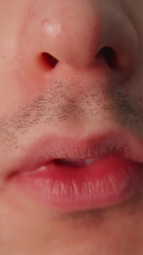 Close up of dry chapped man lips needing lip balm 스톡 동영상 347068863