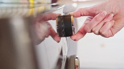 Close-up of the dryer or washing machine control panel, a woman selects program Video stock 320007638