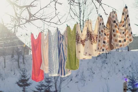 Close up drying clothes in cold weather concept photo Stock Photos