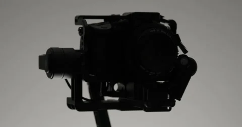 Close-up of DSLR Movement on Gimbal. Adjusting Aperture Lens. Stock Footage 145728443