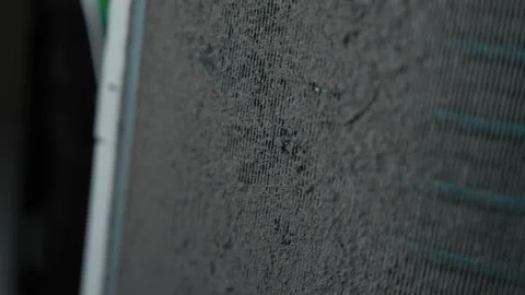 Close-up of a dusty air conditioner filter or mesh screen with dirt buildup.. Vídeo Stock 338319372