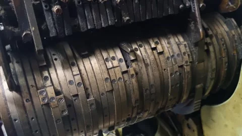 Close-up of a dusty cam drum from a 1950s sock knitting machine, once part of Stock Footage 312229246