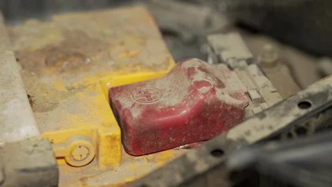 A close up of a dusty car battery positive terminal. Stock Footage 342729182