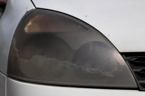 Close-up of dusty headlight. Stock Photos