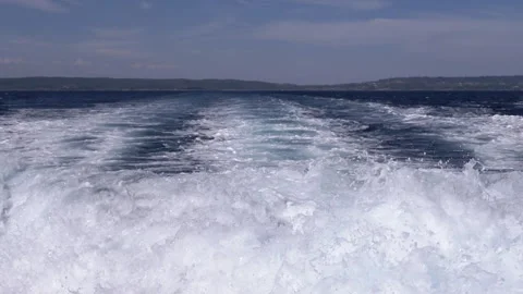 Close-up of dynamic foamy sea waves crashing and raging in the Aegean Sea Video stock 313867631