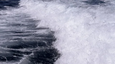 Close-up of dynamic foamy sea waves crashing and raging in the Aegean Sea Stock Footage 313868238