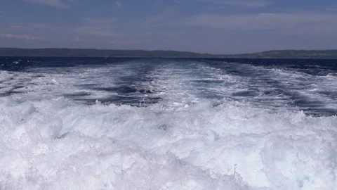 Close-up of dynamic foamy sea waves crashing and raging in the Aegean Sea Stock Footage 313868334