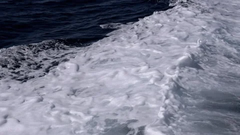 Close-up of dynamic foamy sea waves crashing and raging in the Aegean Sea Stock Footage 313869047