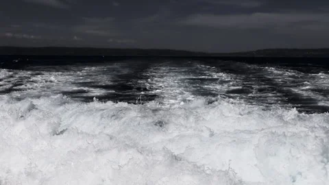 Close-up of dynamic foamy sea waves crashing and raging in the Aegean Sea Video stock 313873749