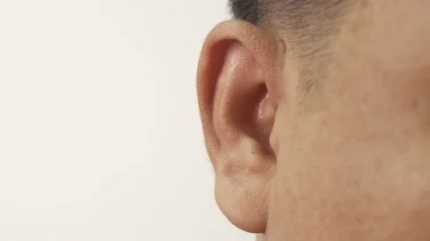 Close-up of ear, Asian man with hearing problems, congenital deafness Stock Footage 229276835