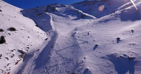 Close up of early snow ski tracks Stock Footage 93486809